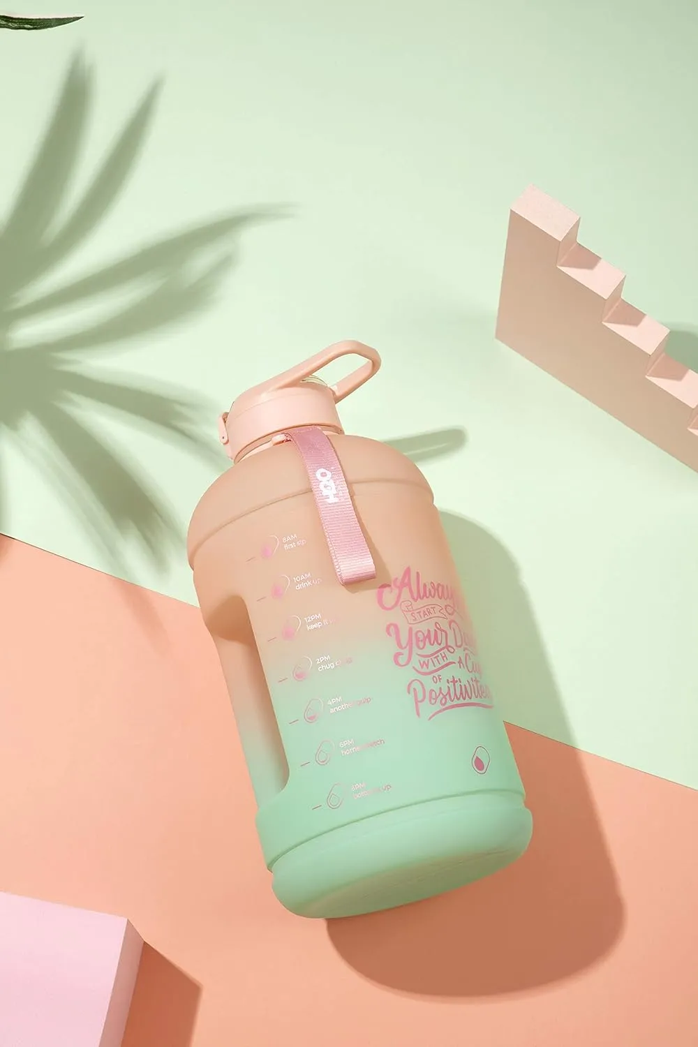 H2O Capsule INSPO Gallon Water Bottle with Time Marker and Straw Motivational Hydration Tracker Jug Big BPA-Free Food-Safe Leakproof Drinking Bottle with Handle & Strap, Lotus Blossom