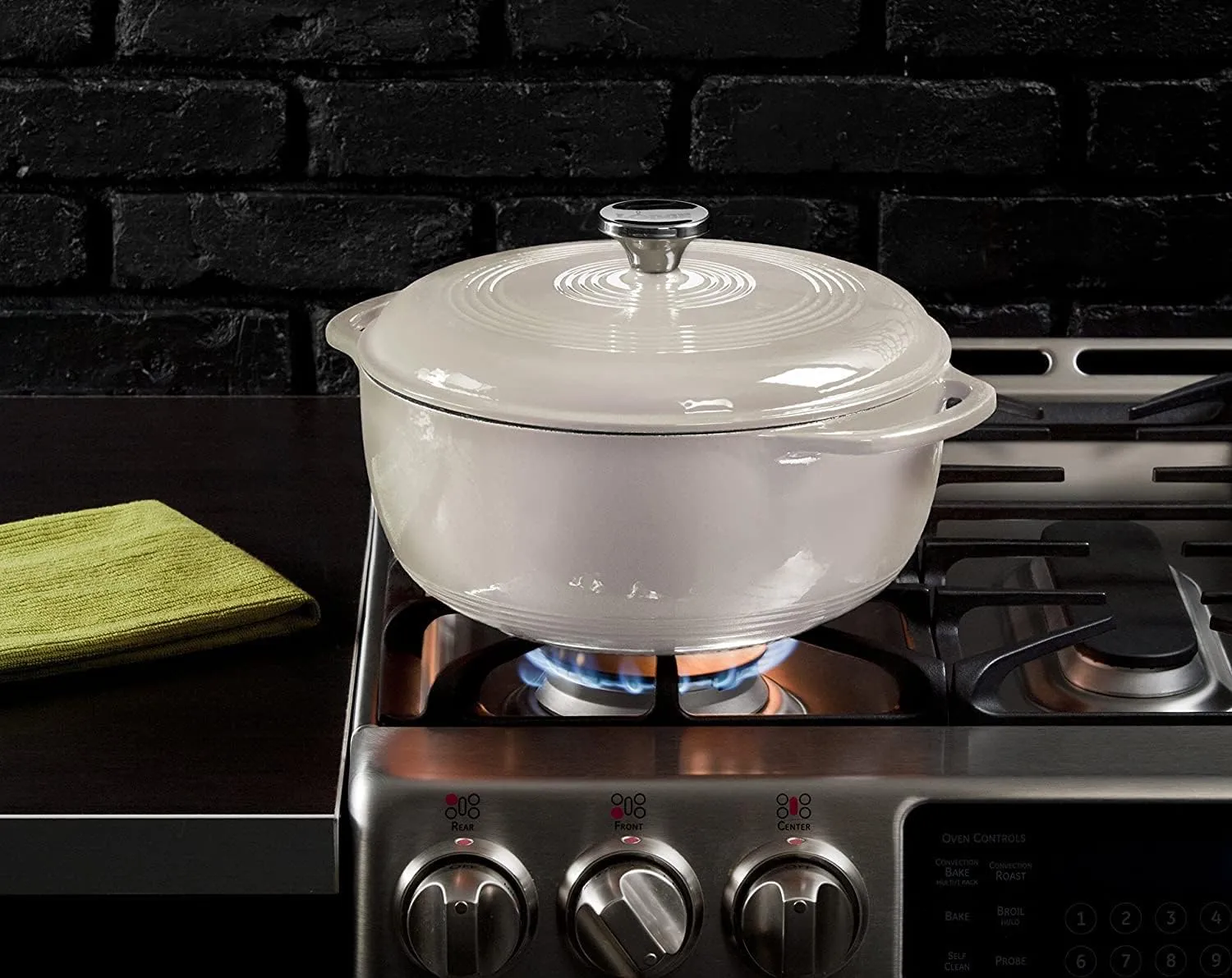 Lodge 7.5 Quart Enameled Cast Iron Dutch Oven with Lid – Dual Handles – Oven Safe up to 500° F or on Stovetop - Use to Marinate, Cook, Bake, Refrigerate and Serve – Oyster White