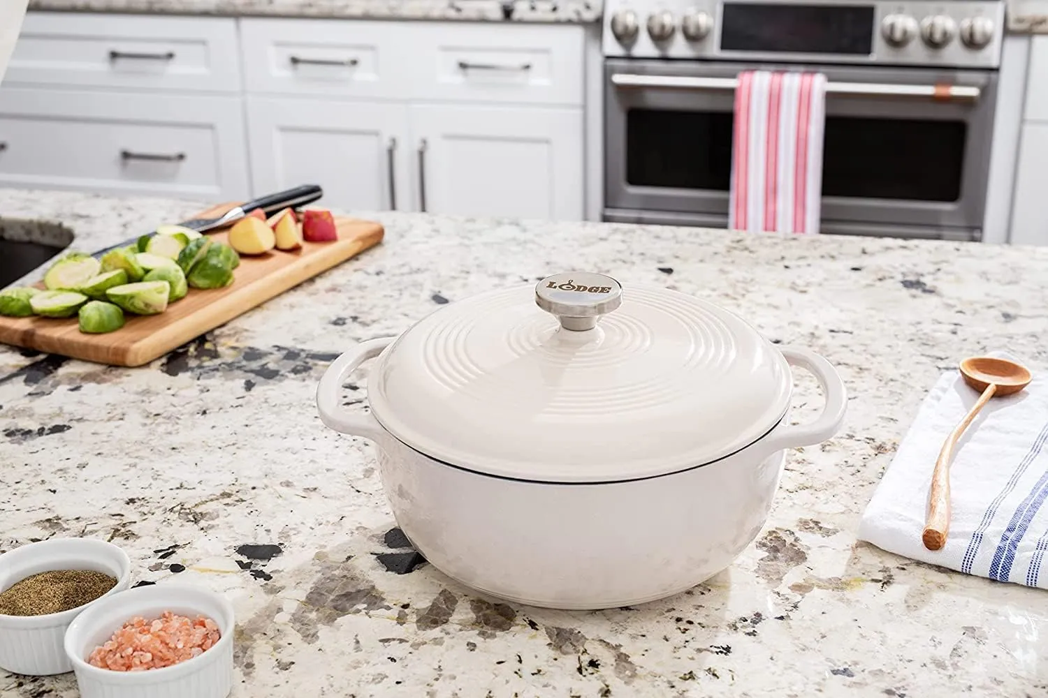 Lodge 7.5 Quart Enameled Cast Iron Dutch Oven with Lid – Dual Handles – Oven Safe up to 500° F or on Stovetop - Use to Marinate, Cook, Bake, Refrigerate and Serve – Oyster White